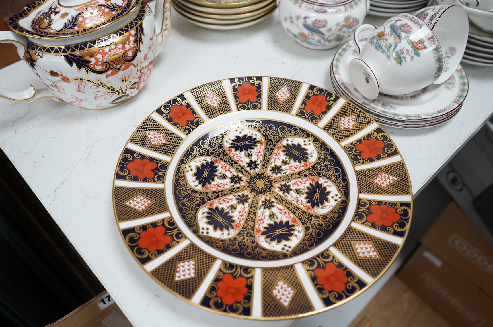 A Wedgwood Kutani crane part tea service, a collection of Cauldon tea wares and two pieces of Crown Derby Imari, largest 27cm in diameter